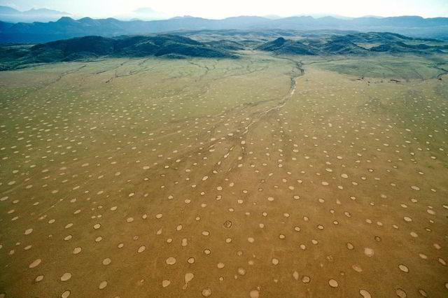 visible hydrogen particles over a vast land